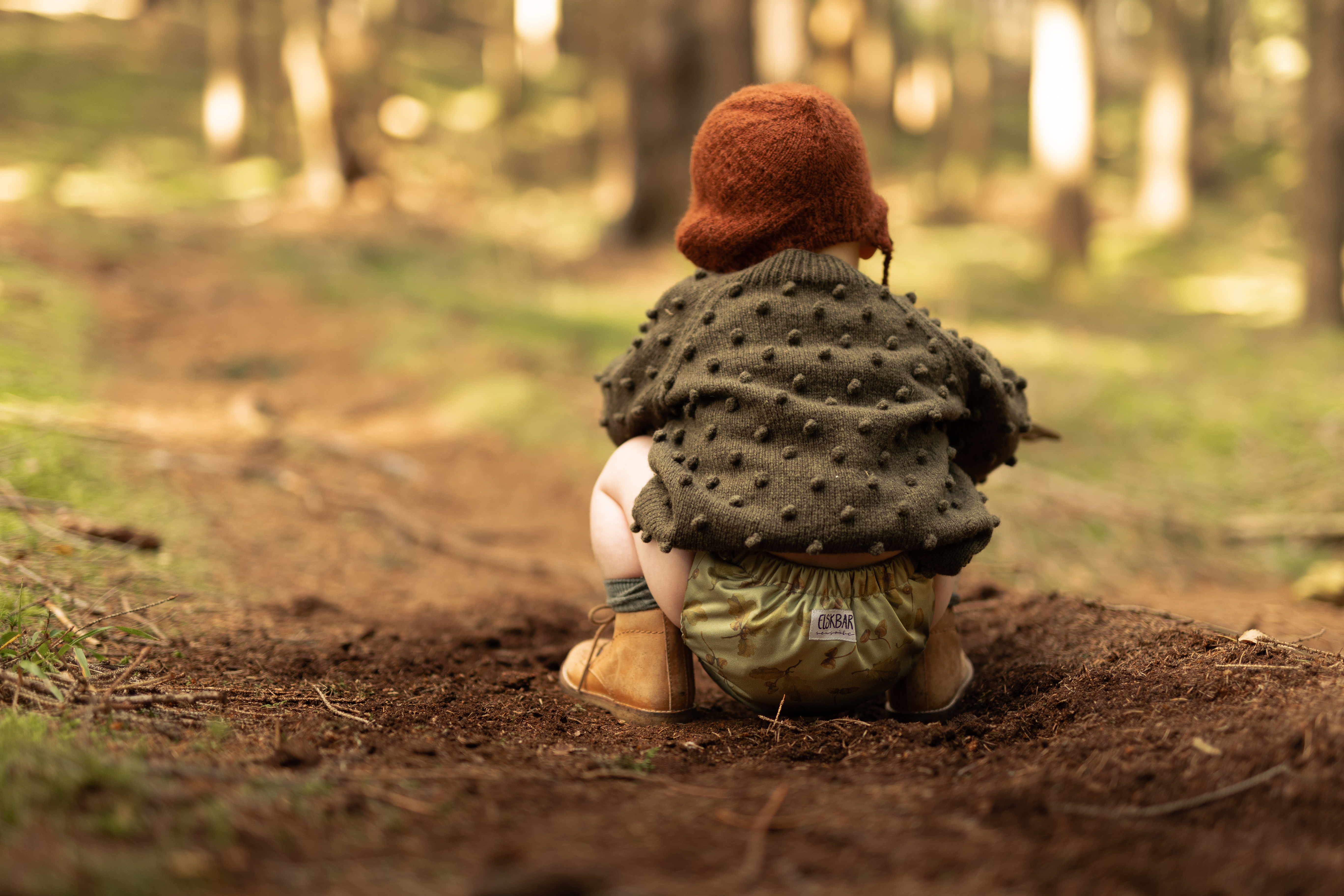 Boy in the forest with cloth diaper